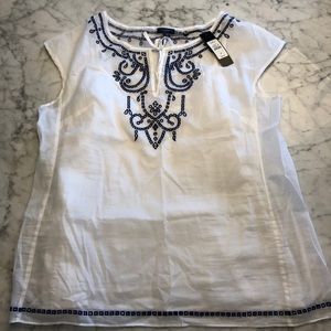 White talbot’s blouse